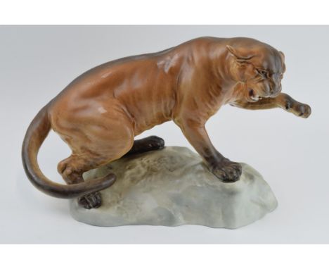 Beswick Puma on Rock 1702 in gloss colourway.  In good condition with no obvious damage or restoration. Crazed.