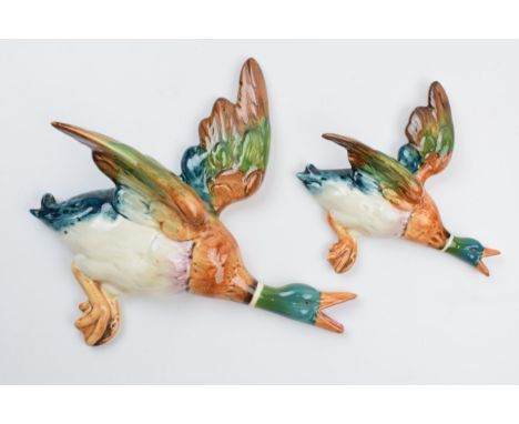 Beswick flying mallard wall plaques to include 596-2 and 596-4 (2).  In good condition with no obvious damage or restoration.