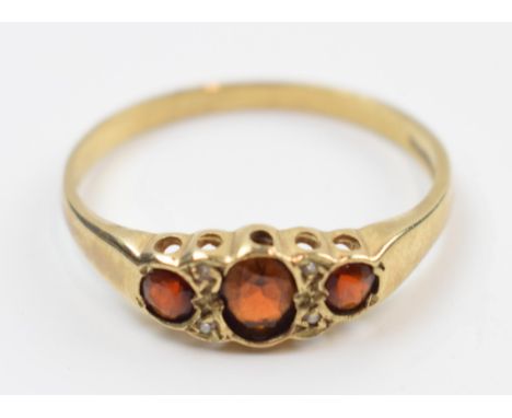 9ct gold ring set with garnets and diamonds, 1.8 grams, size T.  