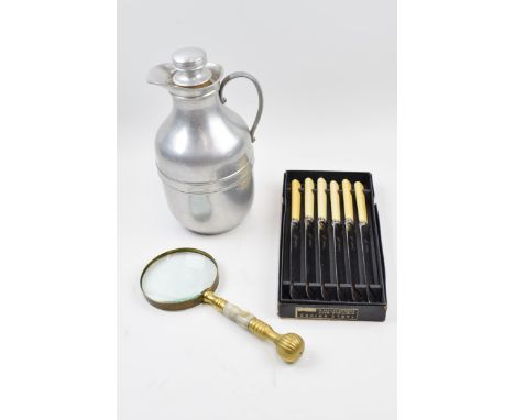 A trio of items to include a vintage Thermos flask, a brass and onyx style magnifying glass with a set of 6 knives (3).  