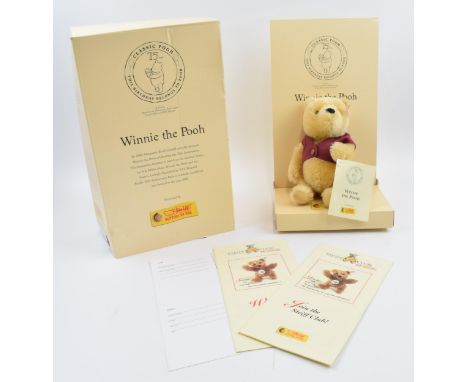 Winnie the Pooh Steiff bear. Celebrating the 75th anniversary. Limited edition for the year 2001. Height 10cm.  In boxed cond