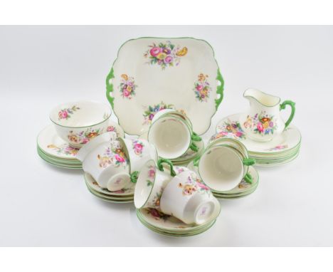 George Jones &amp; Sons Crescent China tea set in a floral green design to include a cake plate, a milk and sugar, 12 cups, 1