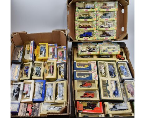 A large collection of boxed die-cast model trucks and cars. Includes Darling Buds of May collection. 3 Trays.  In good boxed 