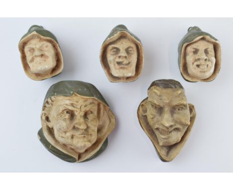 Unusual vintage cast plaster wall hanging busts in the form of beggars and evil looking character, one in the form of Mephist