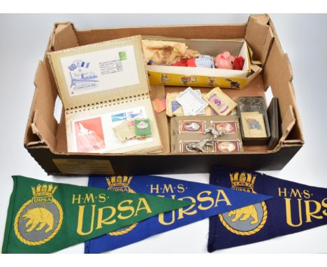 A good collection of mixed ephemera to include cigarette cards, a Pelham puppet, three naval pennants and two dog figures.  G