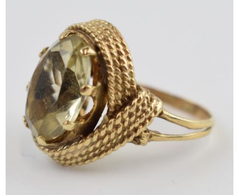 9ct gold chunky dress ring set with smoky stone, 9.4 grams gross weight, size Q.  