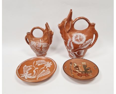 Collection of Brazilian (Bahia) redware, 20th century, comprising two stylised ox-formed pouring vessels (tallest 38cm) and a