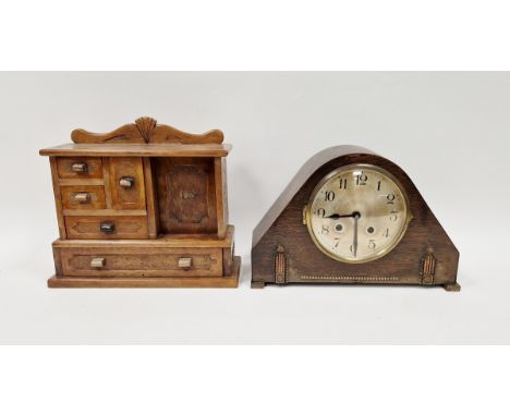 Mid-20th century oak-cased mantel clock, the circular dial having Arabic numerals denoting hours, the dial marked 'Foreign', 