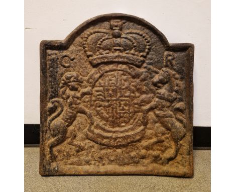 Large cast iron fireback depicting coat of arms of Charles I, measuring approx. 56cm high x 53cm wide