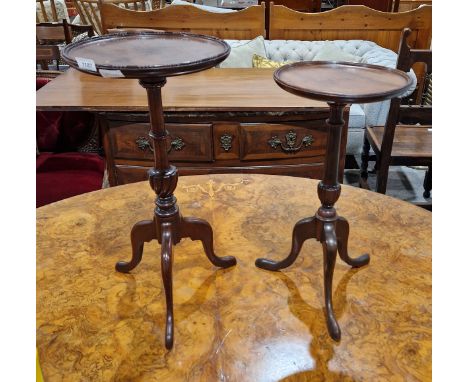 Two Georgian-style mahogany wine tables, each with tapering gadrooned column support, on tripod base, tallest 54cm high x 28c