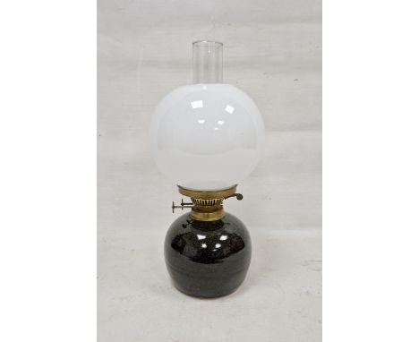 Oil lamp&nbsp;mounted on a Ray Finch (1914-2012) Winchcombe studio pottery globular stoneware base, enriched in a tenmoku gla