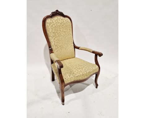 Late 19th/early 20th century mahogany armchair&nbsp;with carved floral finial, with upholstered seat and back, raised on fron