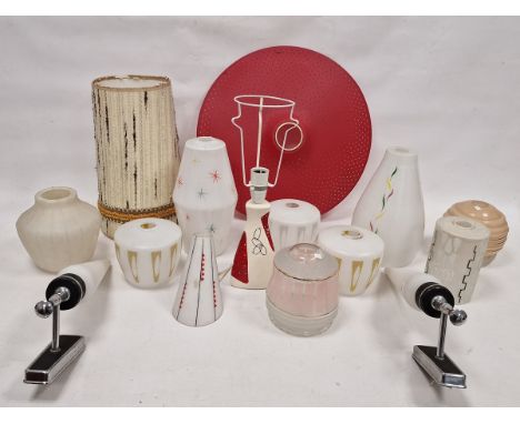 Collection of mid-century light fittings, predominantly opaque glass, some decorated with geometric motifs, including a conic