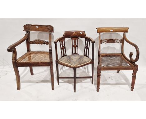Two 19th century mahogany caned dining chairs, the first&nbsp;carved with palmettes and with scroll arms, on reeded gadrooned