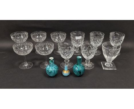 Five star-cut and engraved champagne coupes, five thistle engraved diamond-cut rummers, a Regency-style rummer on square foot