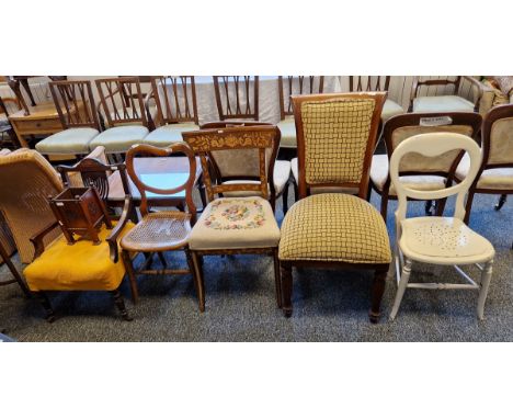 Late 19th/early 20th century mahogany low armchair, with inlaid marquetry and stringing throughout and pierced splat, 75cm hi