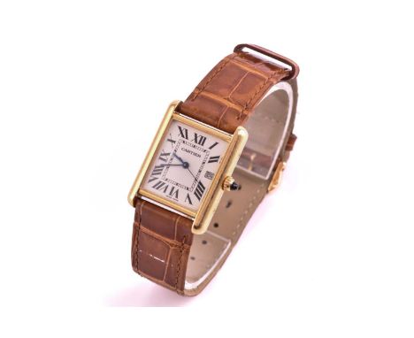 An 18ct yellow gold Cartier Tank mid-size with a quartz movement in an 18ct yellow gold case measuring 25mm x 25mm with a whi