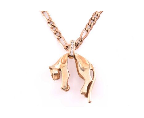 A cat pendant on chain, depicting a stylised cat being picked up by its middle, suspended on a loop, white stones set on eyes