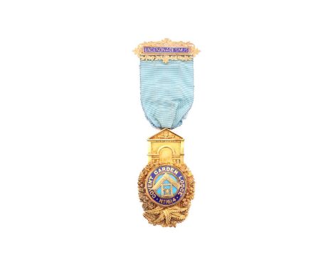 An 18ct gold and enamel Masonic medal, the Past Master's jewel was presented to Worshipful Brother Henry J. Keen by the membe
