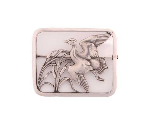 Georg Jensen - a rectangular openwork brooch, depicting a duck flying above pond bulrushes, fitted with hinged pin stem and r
