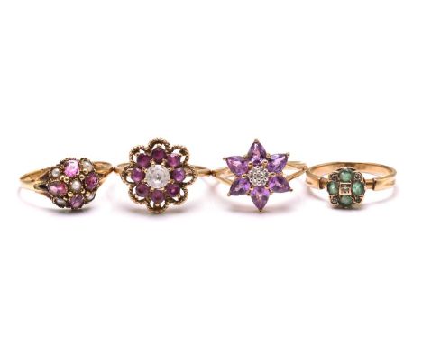 A mixed collection of four flowerhead rings, to include a pink stone with split pearls ring in yellow metal, one out of four 