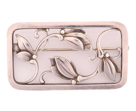 Georg Jensen - a rectangular openwork floral brooch, with swirling foliate motif to the centre, fitted with hinged pin stem a