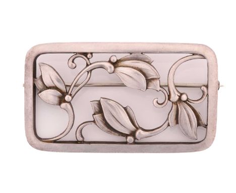 Georg Jensen - a rectangular openwork floral brooch, with swirling foliate motif to the centre, fitted with hinged pin stem a