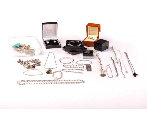 A collection of silver and white metal jewellery including a charm bracelet, an Emporio Armani necklace with cross pendant, a