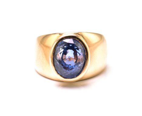 A sapphire cocktail ring, featuring an oval fancy cut sapphire with bright cornflower blue body colour, approximately measuri