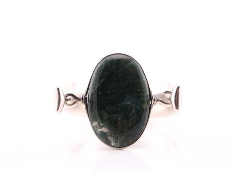 Georg Jensen - a tension clamp opening moss agate bangle, with an oval moss agate panel set in a ring mount, to a tapered con