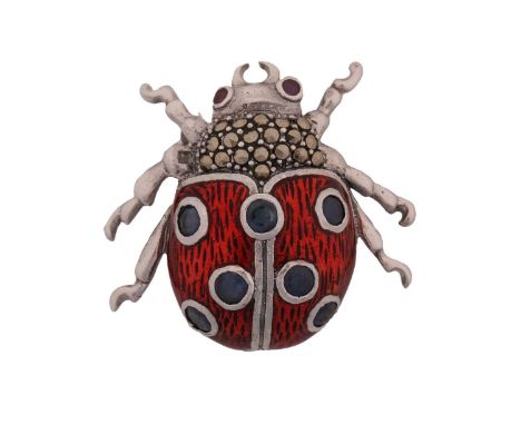 A contemporary white metal and cold enamel insect brooch/ pendant in the form of a "Lady Bird" with marcasite and blue stone 