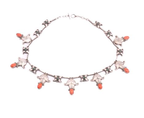 Georg Jensen - A coral and malachite necklace, with seven oval coral and ten round malachite cabochons collet set in silver f