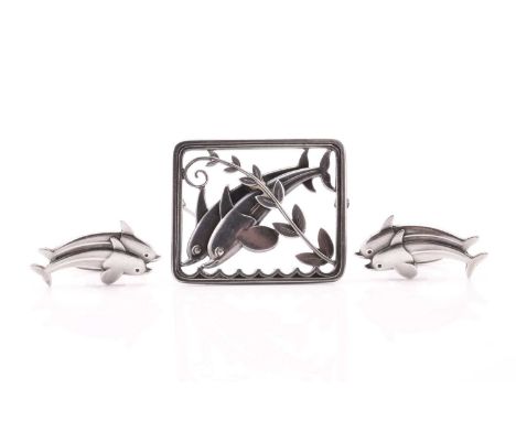 Georg Jensen - a lot with 'double dolphin' brooch and a pair of matching cufflinks, the brooch depicts two dolphins diving wi