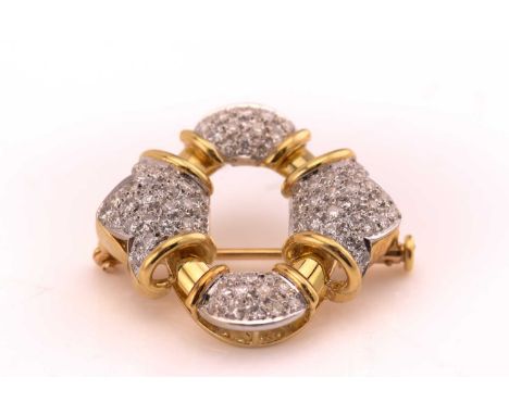 A diamond buckle brooch, with four sections fully pavé set with brilliant diamonds, to an oval ring mount, backed with hinged