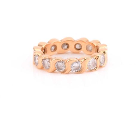 A diamond eternity ring, comprises fourteen round brilliant diamonds with an estimated total weight of 3.5ct, bar set on yell