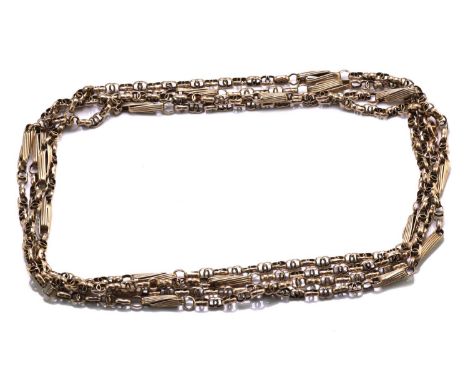 An early 20th-century muff chain, with fancy links and a later replaced clasp, metal unmarked, overall length 141.0 cm, total