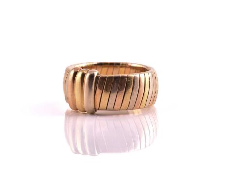 Cartier - Tri-coloured tubogas band ring, with domed 'Fil' band with three colour gold ribbed perpendicular motif, French hal
