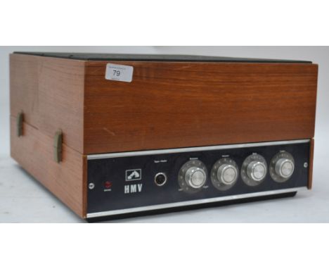 A vintage / retro HMV portable record player, having a BSR record deck, hinged lid and carry strap

UK, European & Worldwide 