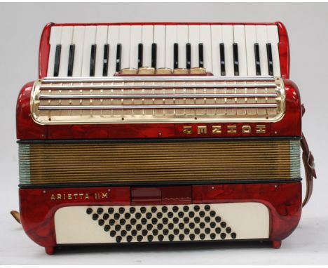 A cased Hohner Arietta 11m Accordion complete with the straps.

UK, European & Worldwide packaging available on all lots. Ple