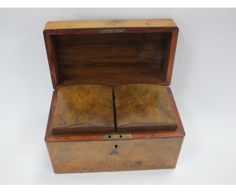 A XIX Century Walnut Tea Caddy, with twin domed inner compartments, 24.5cm wide.