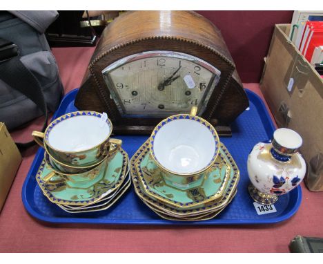 Noritake Tea Ware, of fourteen pieces in green blue and gilt, (two cups damaged). Ovoid vase, Enfield oak cased mantle clock 