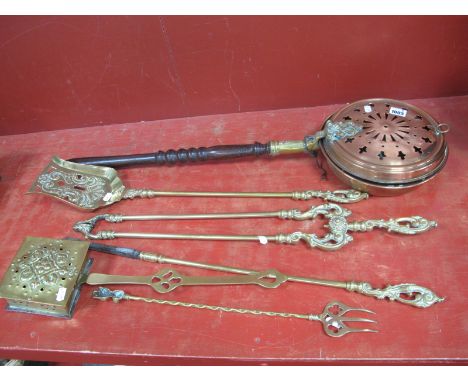 A XIX Century Pierced Copper Warming Pan, with brass and turned wooden handle, a brass chestnut roaster, ornate brass fire ir