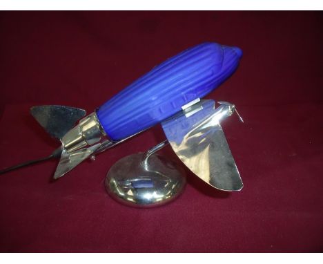 Metal and plastic lamp in the shape of an aircraft 