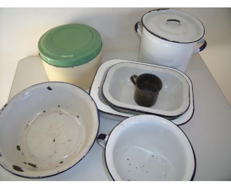 Box containing a selection of various enamel kitchenware including cake tins, casserole dishes etc 