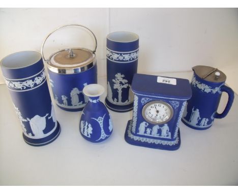 Collection of Wedgwood ceramics including a Wedgewood blue Jasperware ceramics including mantel clock, biscuit barrel, pair o