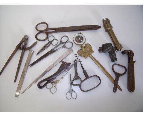 Selection of various vintage and bygone items including dogs head walking cane top, bull head tin opener, compass, scissors, 