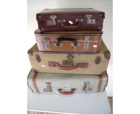 Four vintage suitcases 