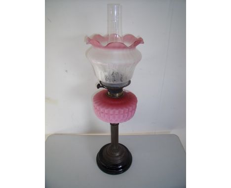 Victorian oil lamp with etched clear &amp; opaque shade and pink glass reservoir on brass column and turned circular base (he
