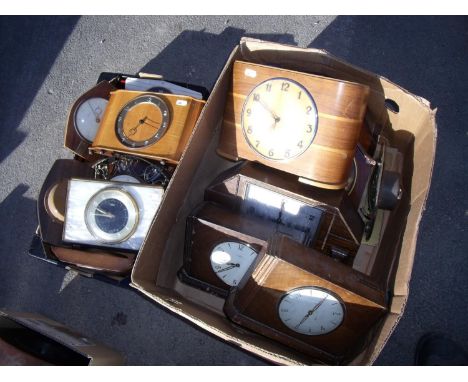 Two Time Saving novelty clocks, another savings clock and other mantel clocks in two boxes 