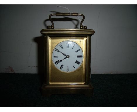 White enamel dial French brass cased carriage clock 